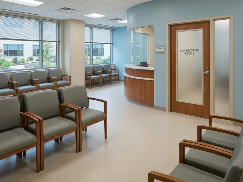 Hospital interiors segment showing waiting area, reception casework and consultation areas